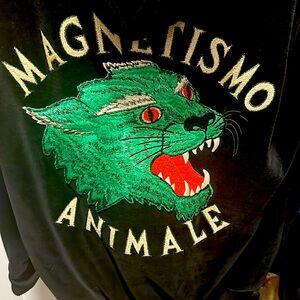 This zip jacket is crafted and is paired with the red and green (Brand New)